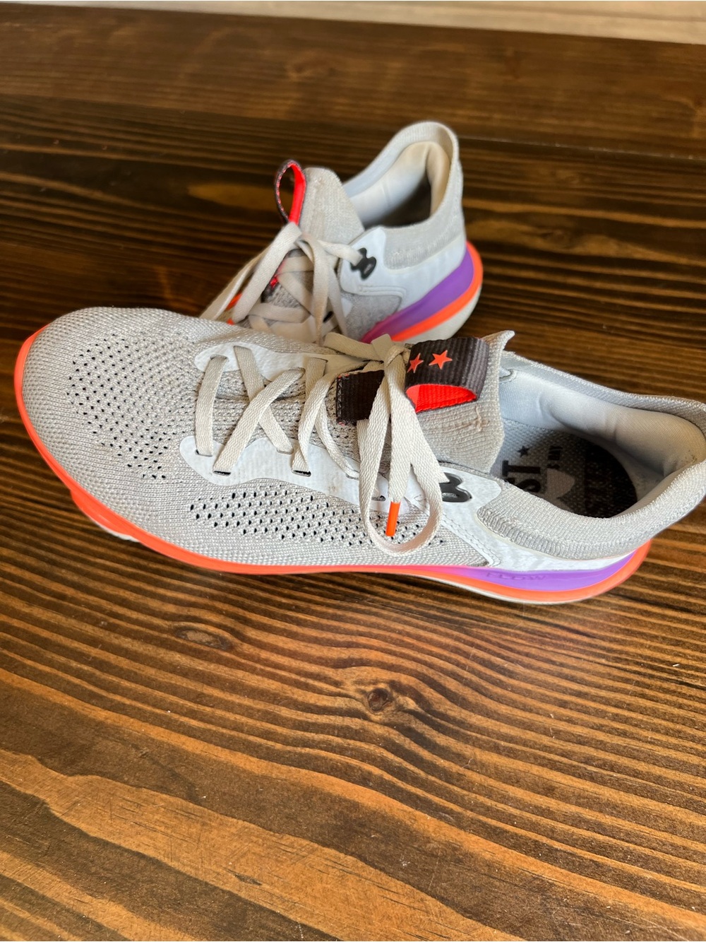 Under Armour Women's Light Gray Running Shoes with Coral & Purple Accents